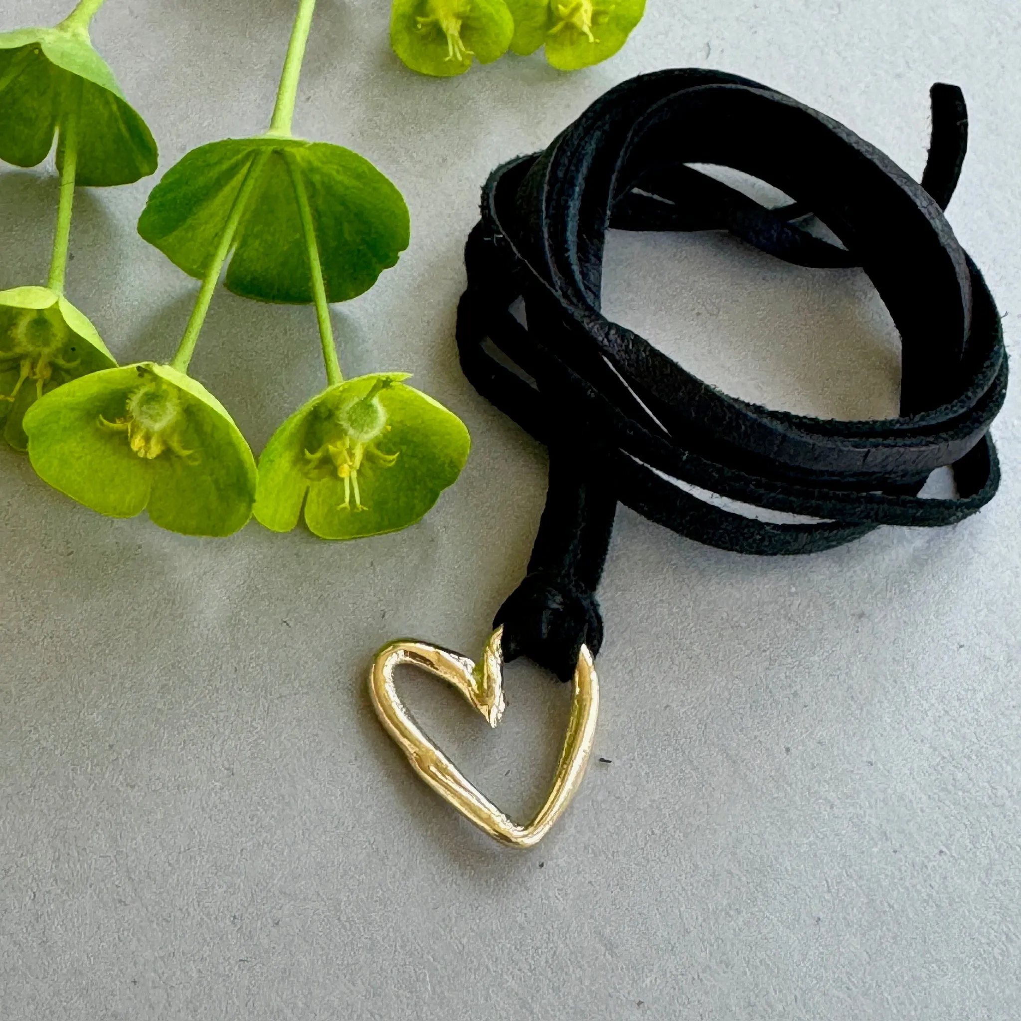 Cherished Charms on Leather Cord